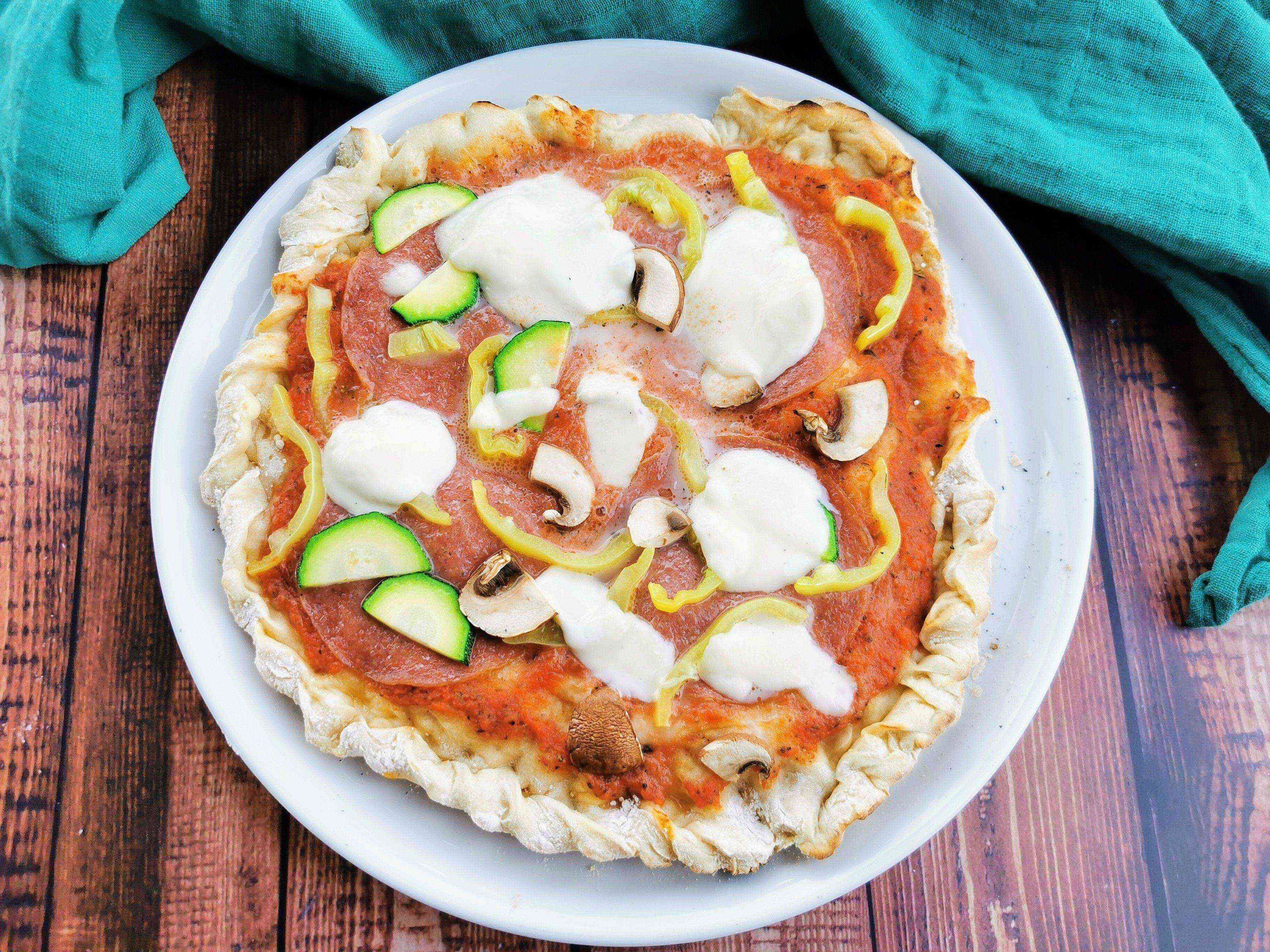 Perfekte Pizza vom Gasgrill: So gelingt's knusprig und köstlich!